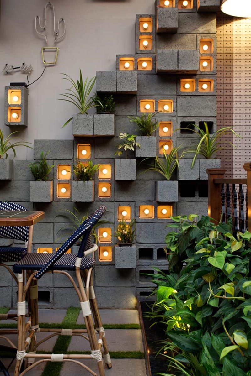 A Concrete Block Planter Wall Was Used To Add Greenery To In Most Recently Released Concrete Wall Art (View 18 of 20)