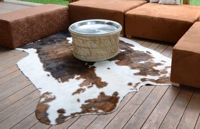 8'x10' Brown Cowhide Rug | Rental Furniture For Events – Marquee Event Throughout Brown Natural Skin Leather Hide Square Box Ottomans (View 4 of 20)