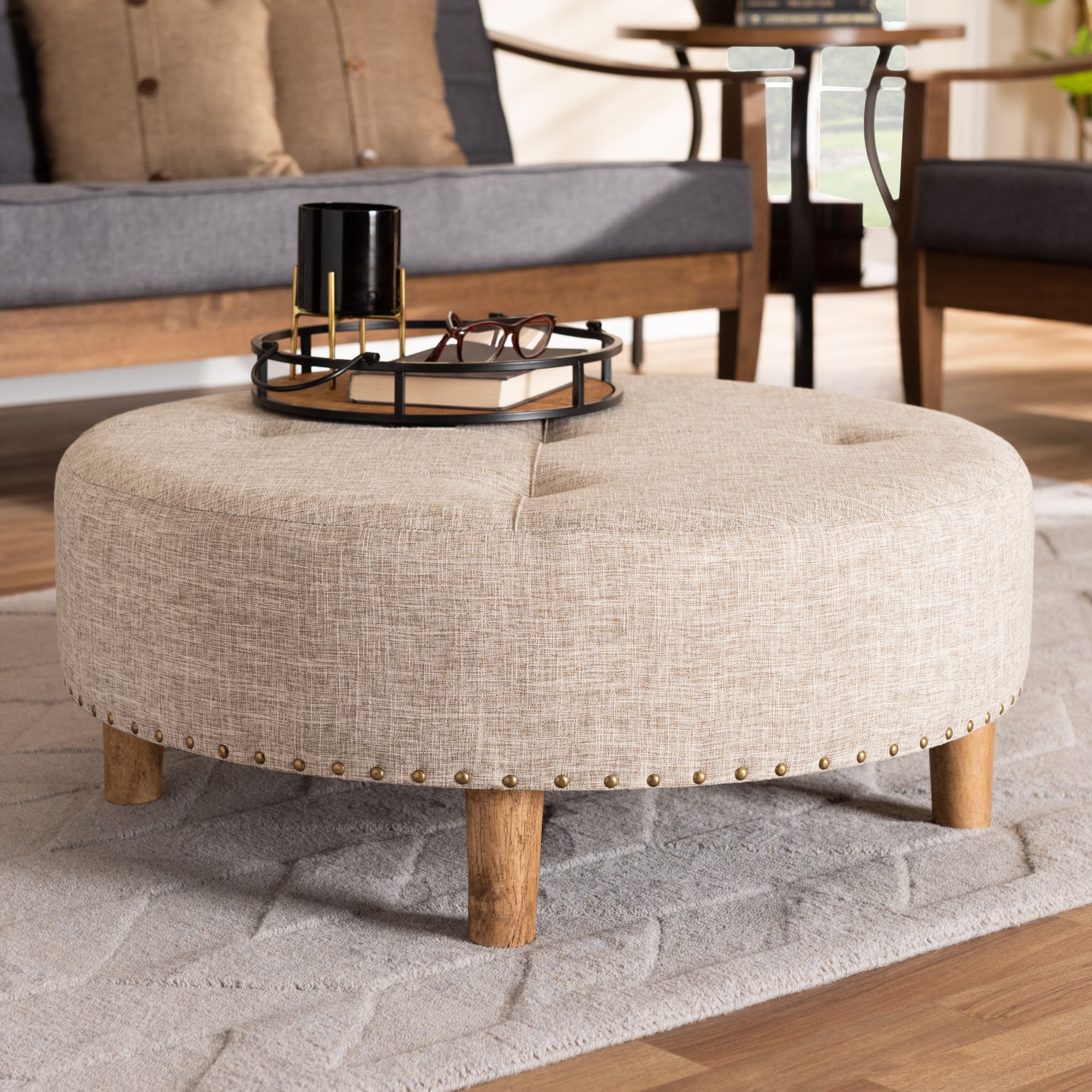 Baxton Studio Vinet Modern And Contemporary Beige Fabric Upholstered Regarding Natural Beige And White Cylinder Pouf Ottomans (View 1 of 20)