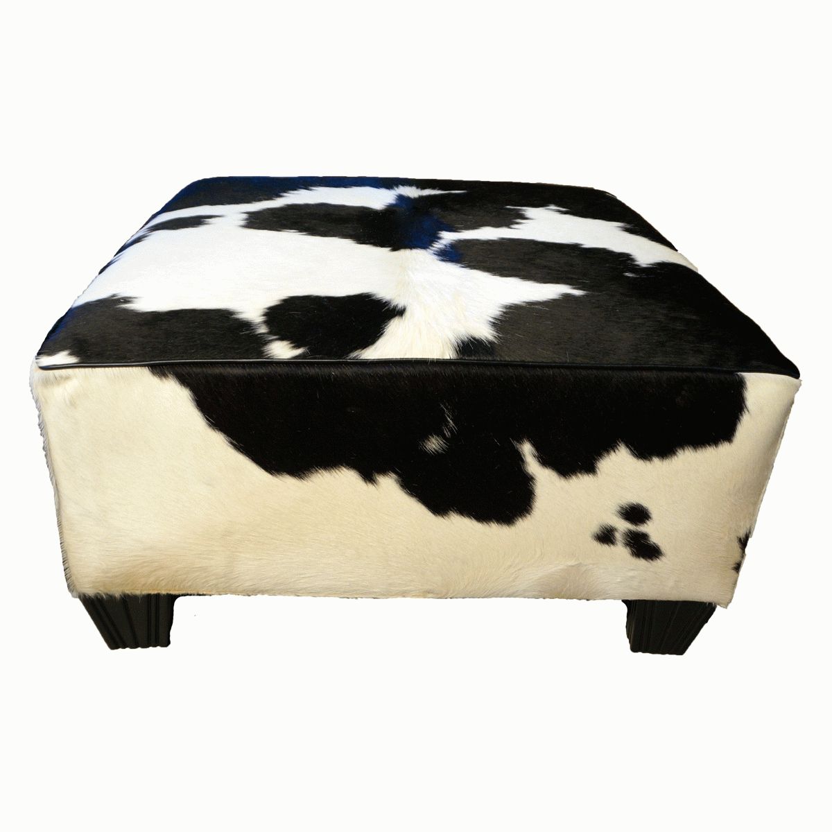 Black And White Solid Cowhide Ottoman Within Black And White Zigzag Pouf Ottomans (View 4 of 20)