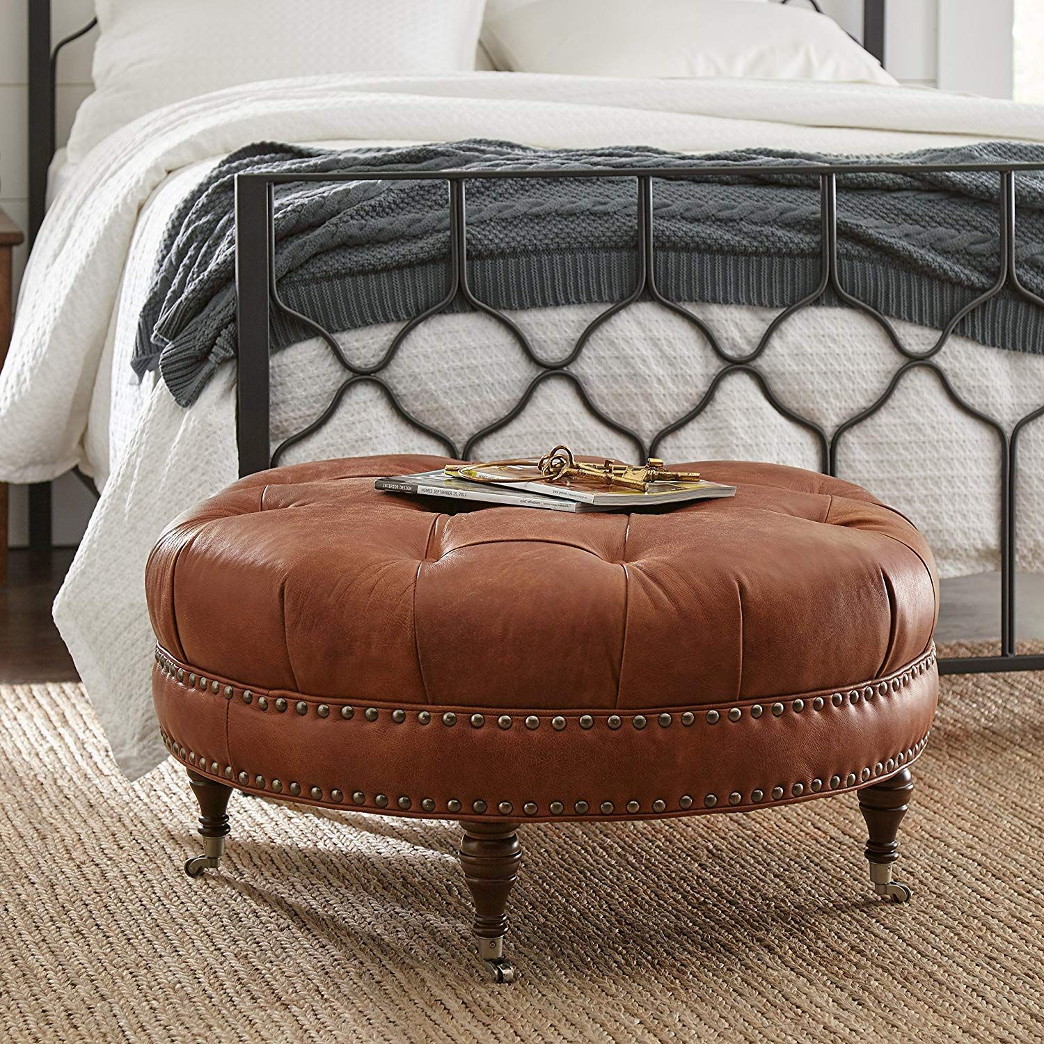 Button Tufted Round Leather Wheeled Ottoman With Spindled Wooden Legs Throughout Leather Pouf Ottomans (View 3 of 20)