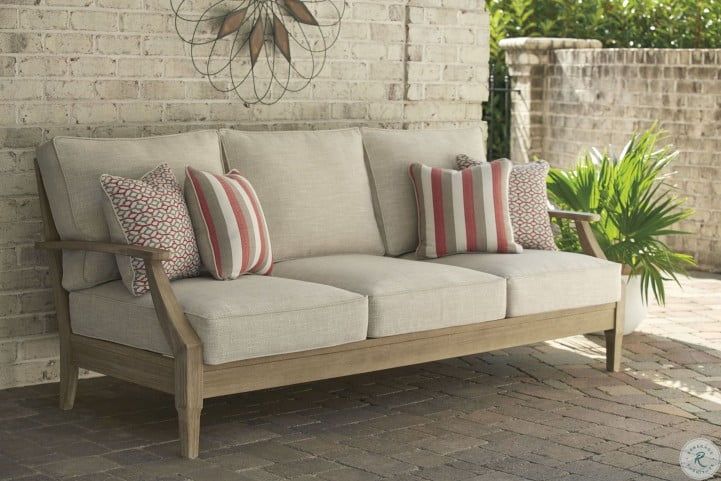 Clare View Beige Outdoor Sofa With Cushion From Ashley | Coleman Furniture Inside Ecru And Otter Console Tables (View 8 of 20)