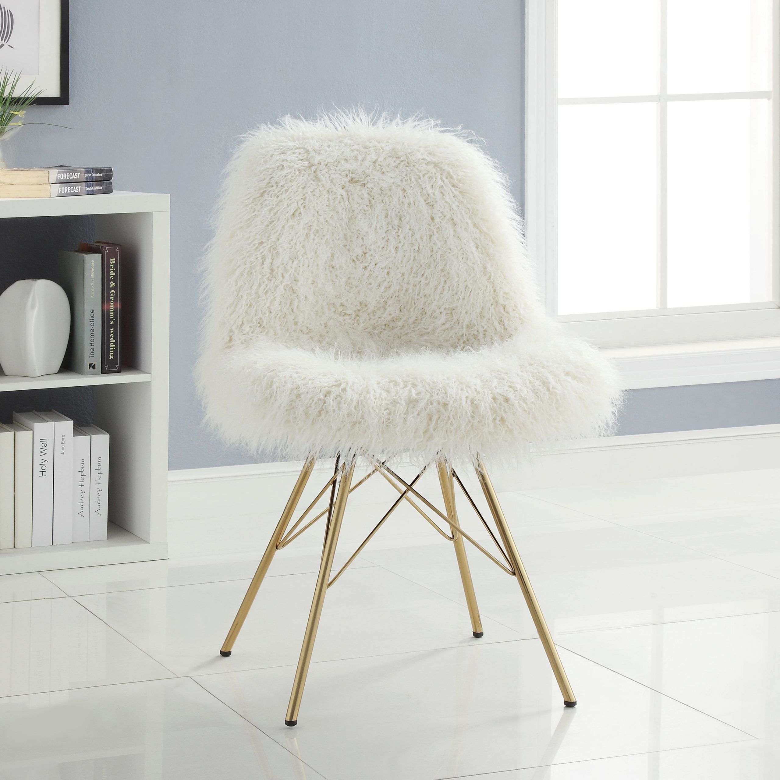 Dramatic And Bold, The Remy Faux Fur Chair Is A Trendy Addition To A For Lack Faux Fur Round Accent Stools With Storage (View 15 of 20)