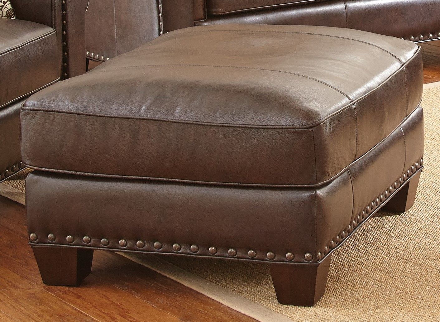 Escher Top Grain Leather Ottoman From Steve Silver (sr810t) | Coleman Pertaining To Weathered Ivory Leather Hide Pouf Ottomans (View 16 of 20)