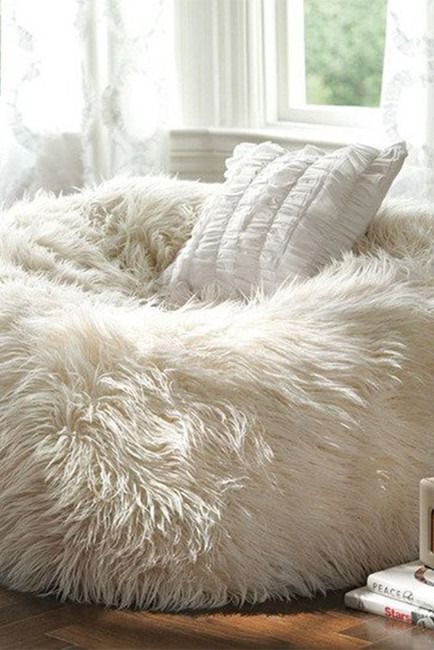 Glam Up Your Bedroom With This Round Shaggy Faux Fur White Ottoman With White Faux Fur Round Accent Stools With Storage (View 17 of 20)