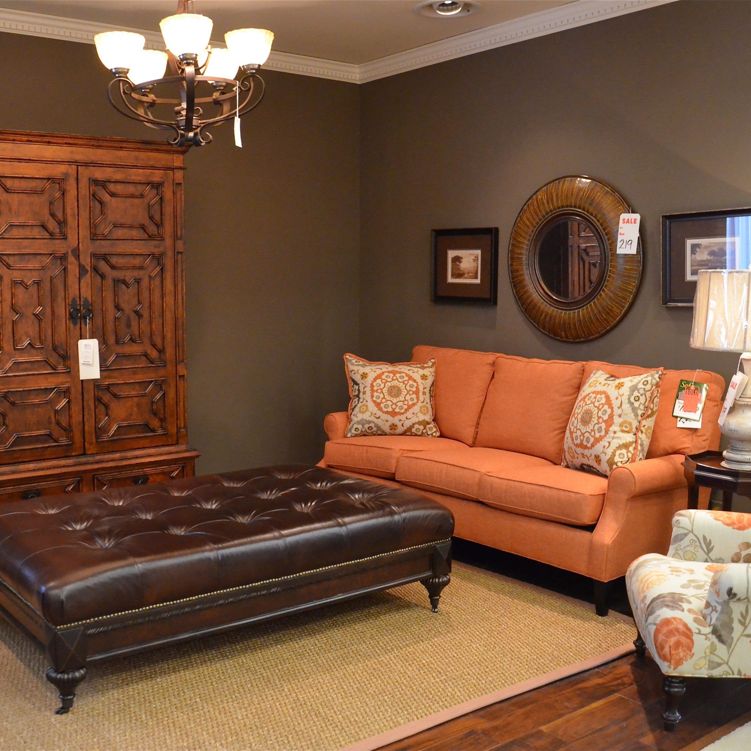 Leather Ottoman Gives An Eclectic Feel To A Formal Space With Oriental Within Tuxedo Ottomans (View 6 of 20)