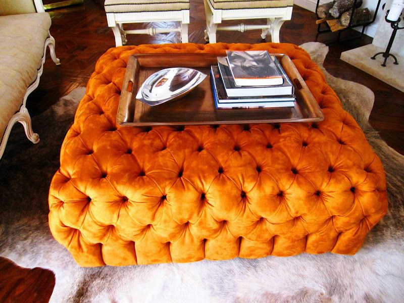 The Meticulous Blend Of Rustic And Chic In A Los Angeles Living Room With Orange Fabric Round Modern Ottomans With Rope Trim (View 10 of 20)