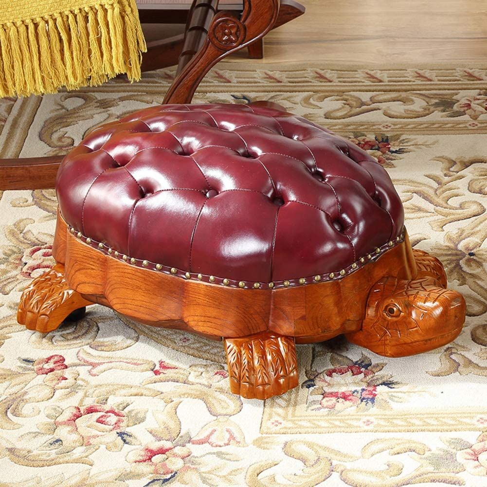 This Hand Carved Wooden And Leather Tortoise Ottoman Will Classy Up Any With Weathered Gold Leather Hide Pouf Ottomans (View 17 of 20)