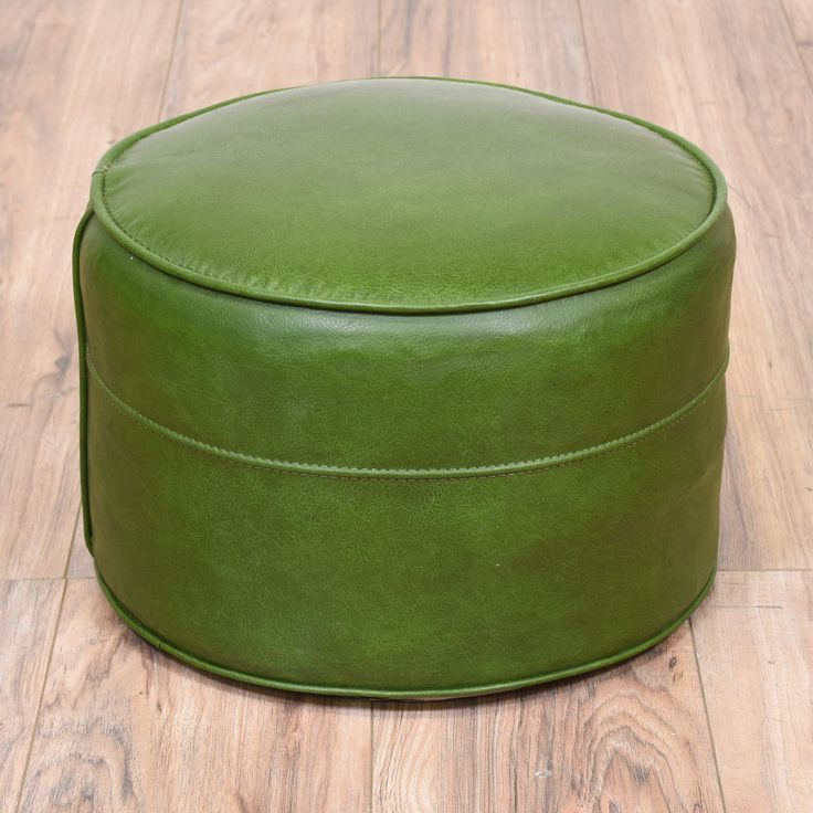 This Round Ottoman Is Upholstered In A Durable Vinyl With A Shiny Green Intended For Green Pouf Ottomans (View 7 of 20)
