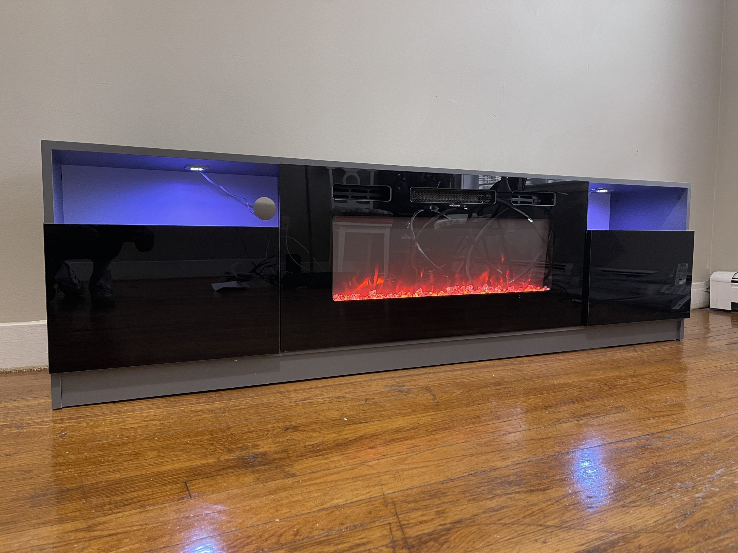 Delaine Tv Stand For Tvs Up To 88" With Electric Fireplace Review In Tv Stands With Led Lights & Power Outlet (Gallery 6 of 20)