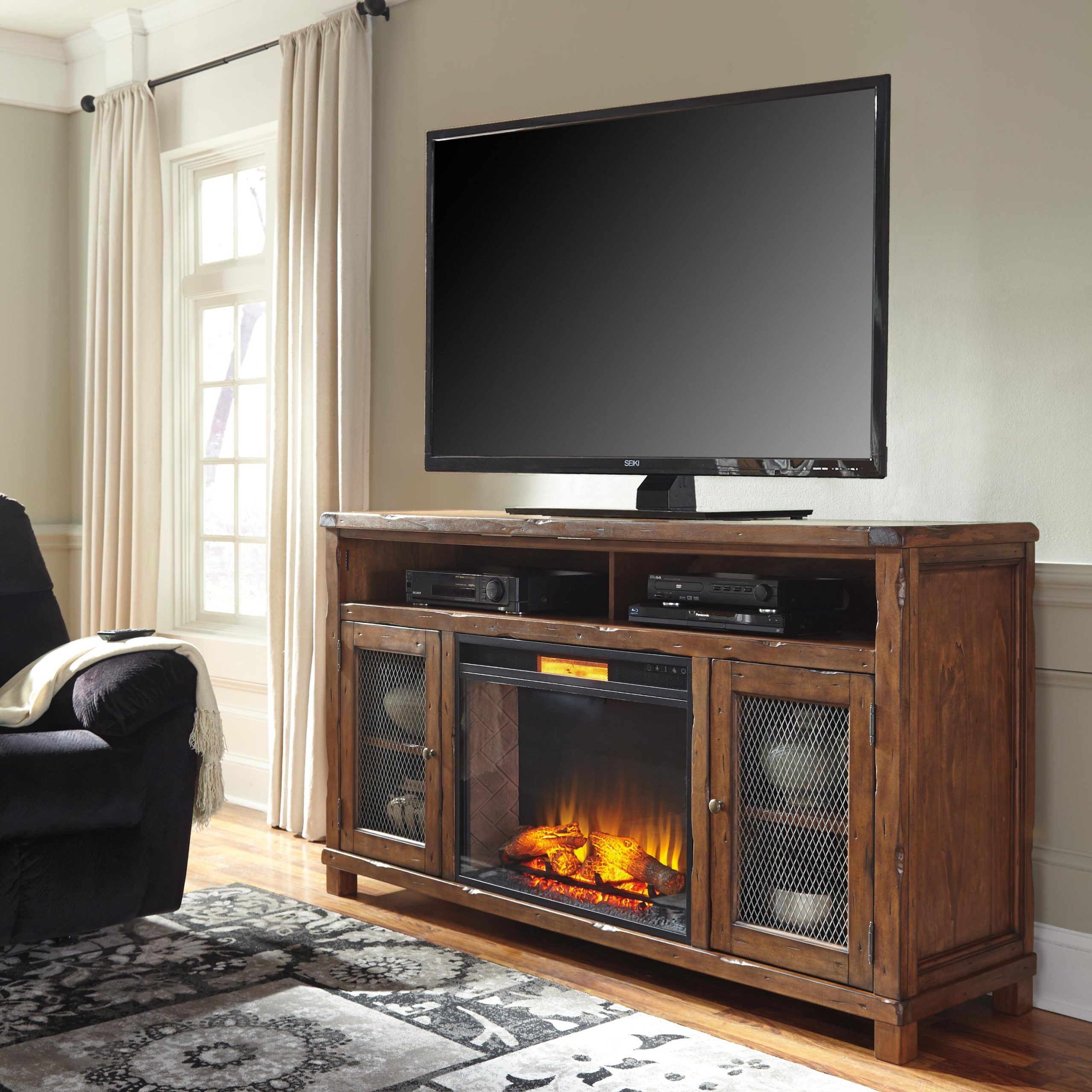 Signature Designashley Tamonie Rustic Mango Veneer Xl Tv Stand With Intended For Electric Fireplace Tv Stands (View 17 of 20)