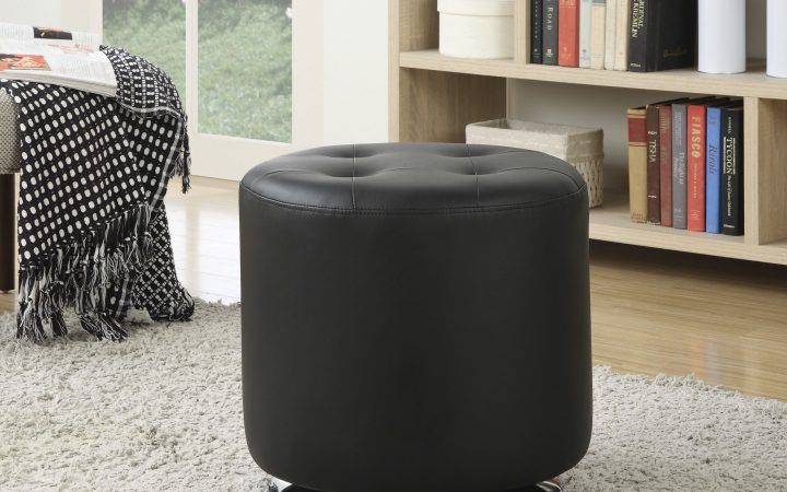 20 Collection of Round Black Tasseled Ottomans